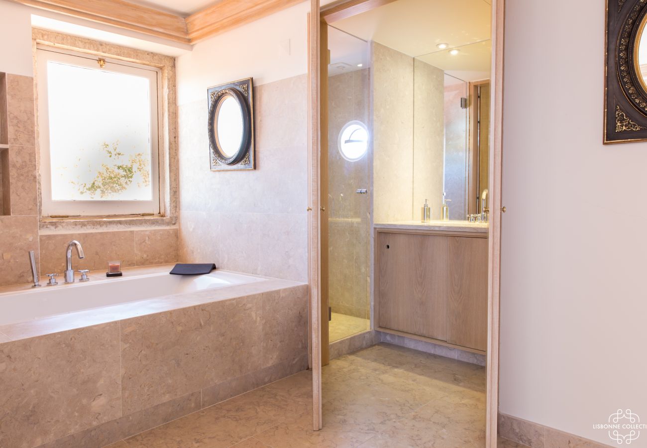 Bright bathroom with stone bathtub and window