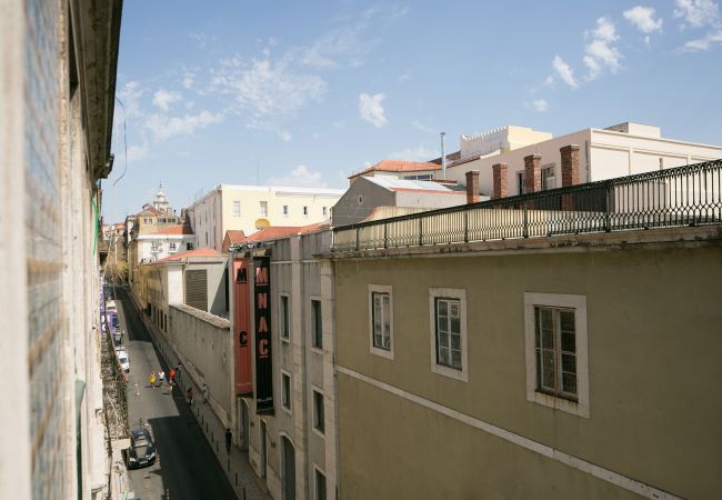 View of the living room window on the Chiado district for your future holidays