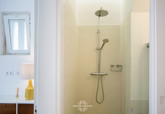 Bright bathroom with large shower and sink