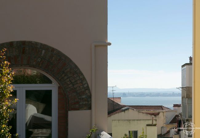 View of the Tagus from the garden of the rental apartment in Lisbon