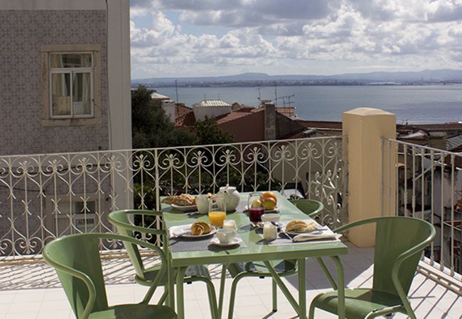 Furnished terrace overlooking the Tagus River and the whole city